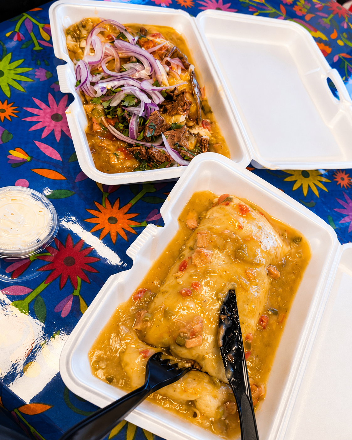 Smothered burrito and loaded Mexican plate from Sabor Express